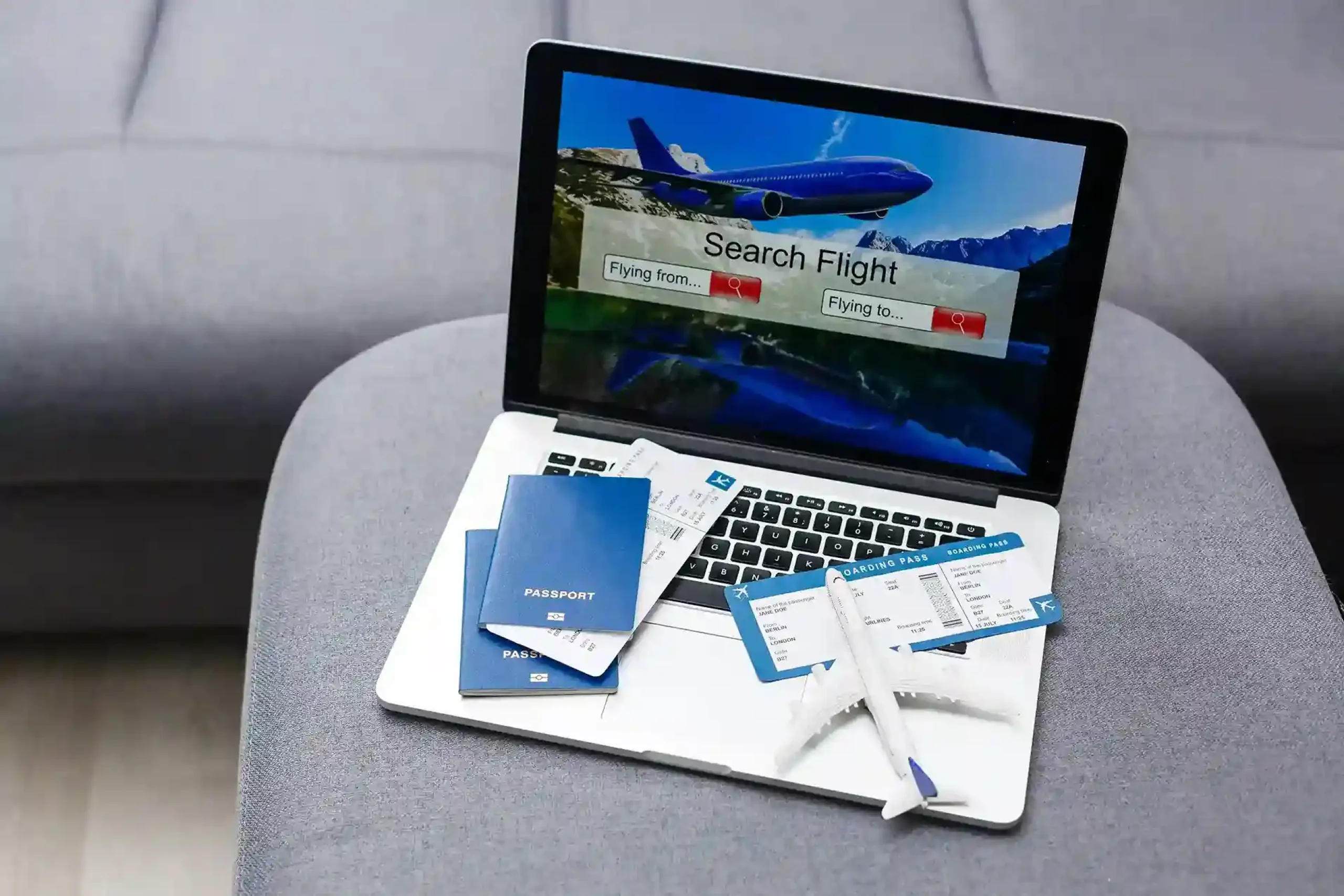 flight-tickets-with-passports-model-airplane-map-gray-background_11zon