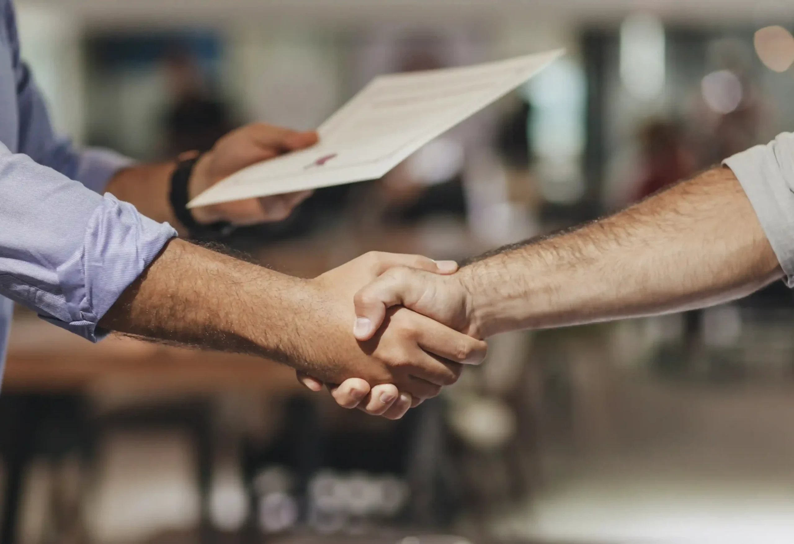 handshaking-businessmen_11zon